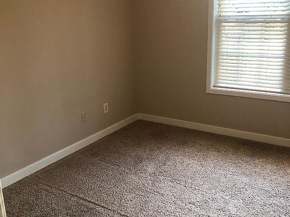Top left corner of room, viewed from entrance.