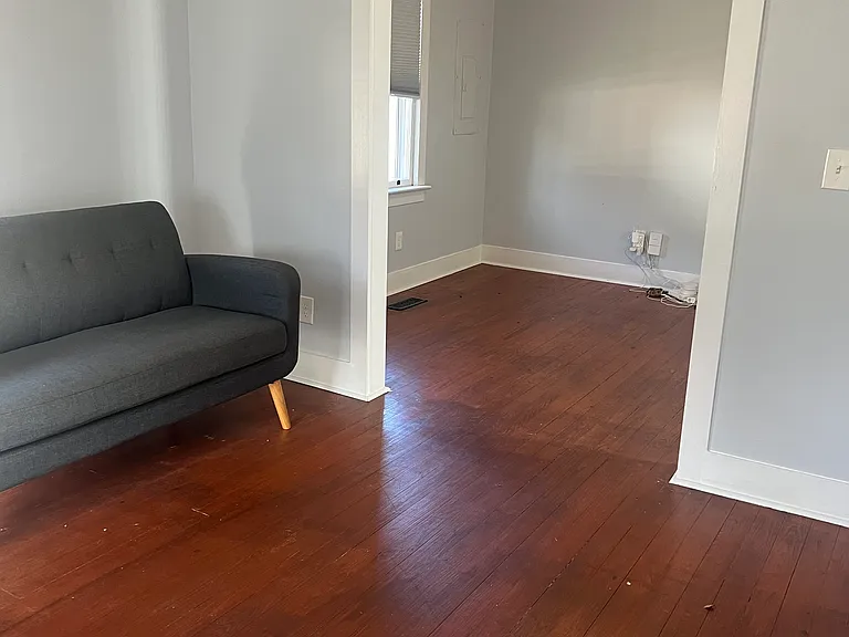 View of living room and dining room from front door.