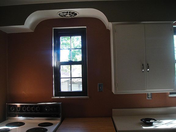 one of 3 kitchen windows