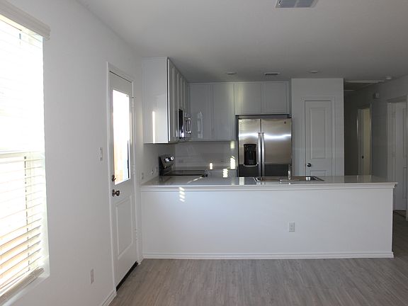 Appliances included: Refrigerator, dishwasher, microwave and electric stove.