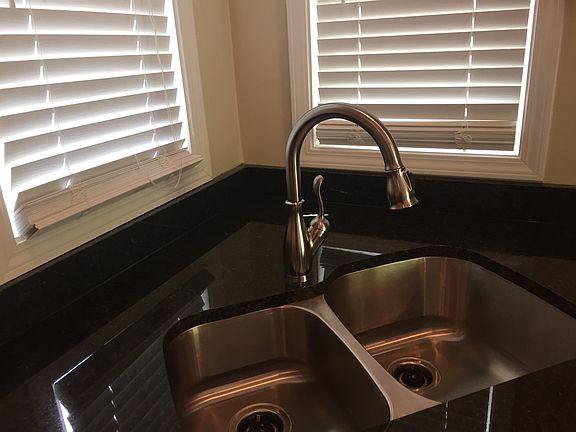 New granite & SS sink & fixt