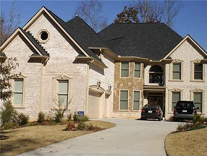 Brick on all 4 sides, nesteled on 1.6 acres