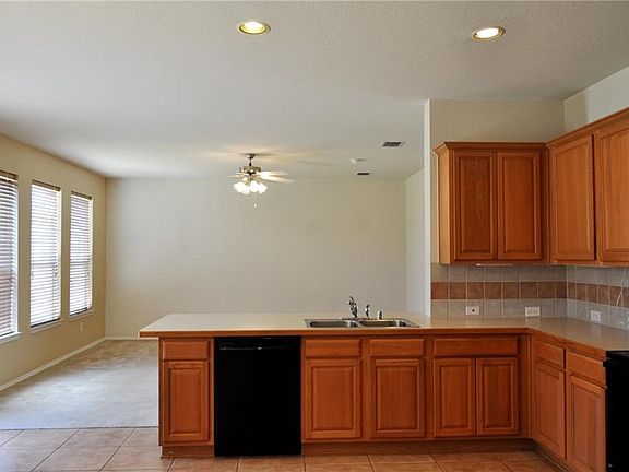 Everyone loves an open concept these day. Flat open work space opens to family room.