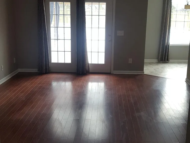 Living room with access to covered patio