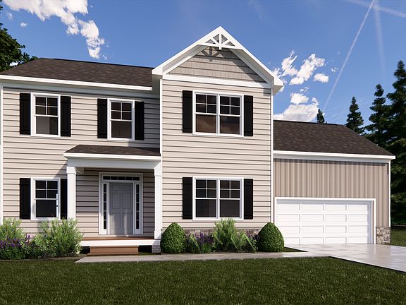 Located in the charming Poplar Village, this two-story Rowland house boasts beige siding, black shut