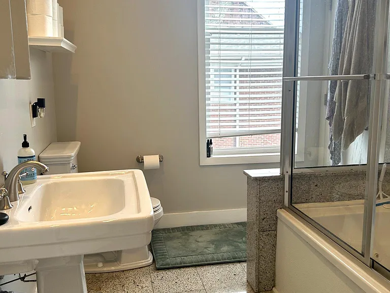 beautiful attached bathroom with jacuzzi jet bathtub and shower. In unit washer and dryer inside bathroom walk in closet.