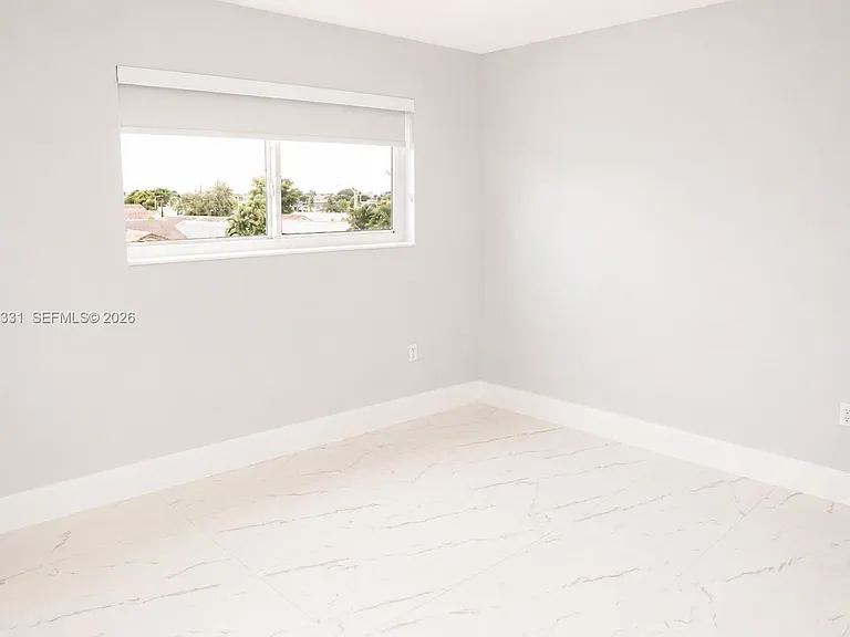 2750 W 76th St #203 — Photo 13
