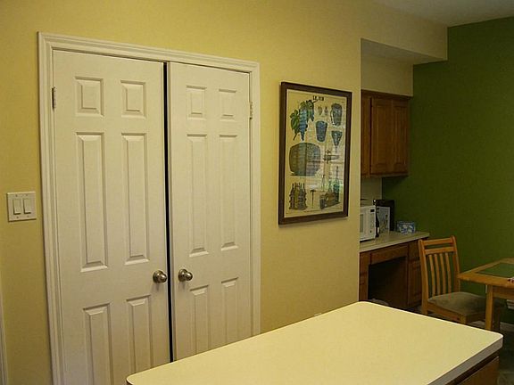 Other side of Kitchen showing the large pantry