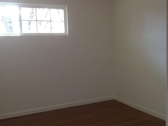 One of three bedrooms