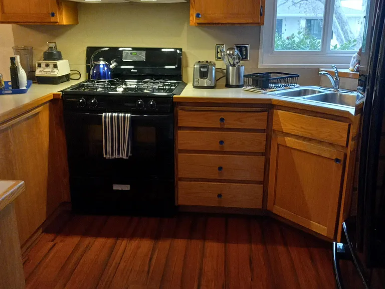 Beautiful new floor and soon to be installed Hunter Douglas shutters!