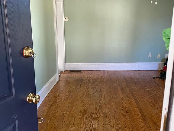 Living room from front door. Hard woods (a bit dusty at the moment because upgrading right now!)