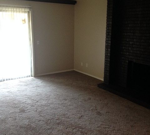 Living Room with adjacent private patio