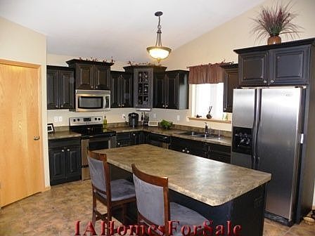 Kitchen. Custom made Cherry distressed cabinetry. One of a kind!