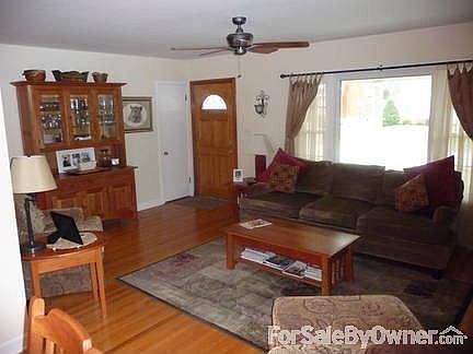 Living Room
						:
						Beautiful hardwood floors, large window, fireplace, open to Dining area.
