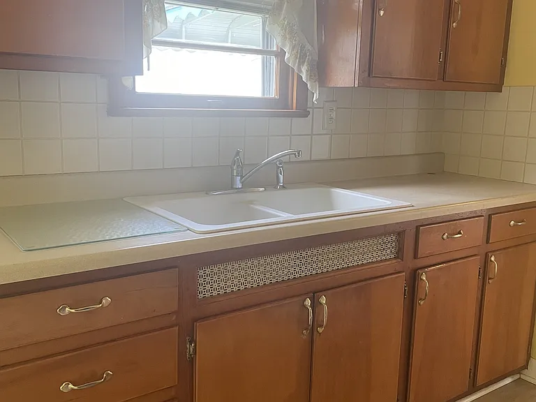 Kitchen sink and cabinets