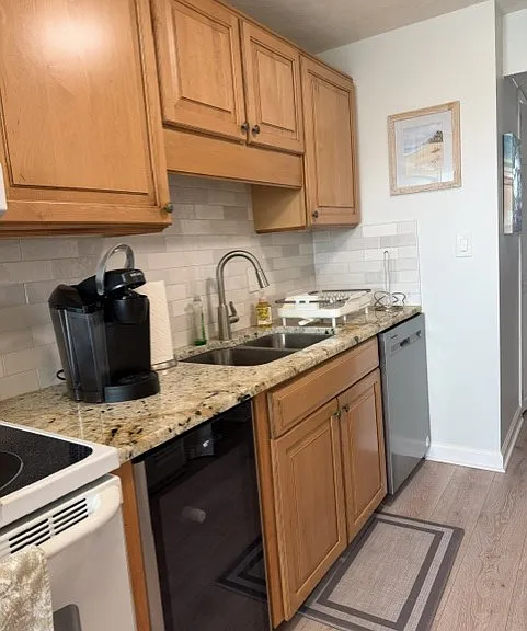 Granite countertops and new sink. Wine fridge!