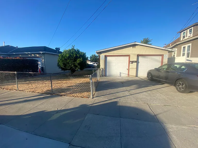 Left side driveway parking spot and left side garage included.