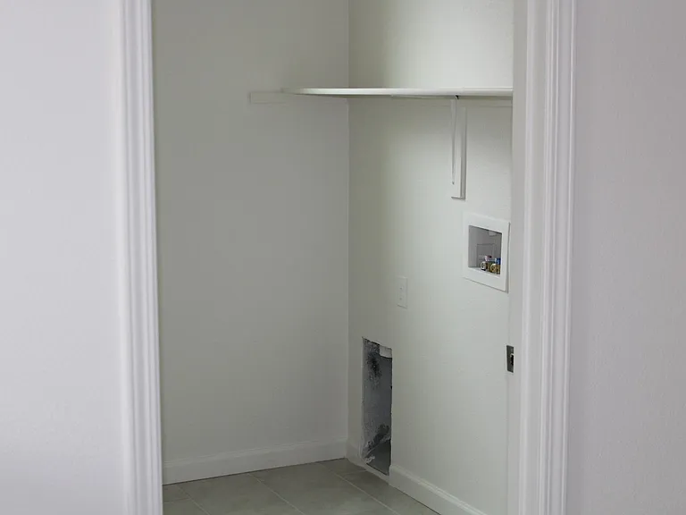 laundry hook ups upstairs with the bedrooms and bathrooms.