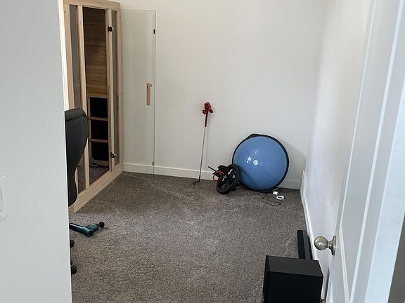 Downstairs bedroom #1 (currently used as office + Sauna)