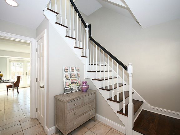 Main level entry looking into family room and theatre