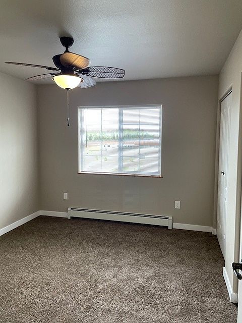 Bedroom 1 with Ceiling Fan and closet