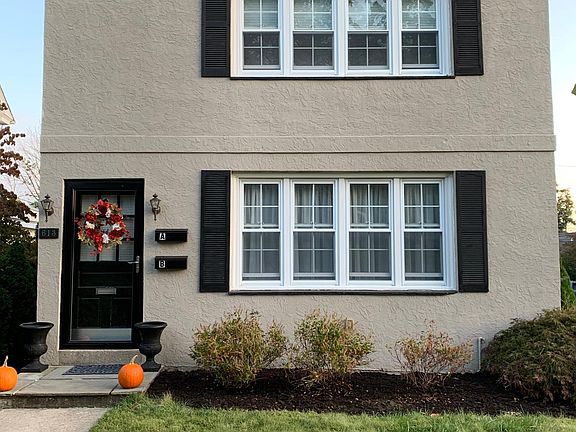 Duplex front faces south