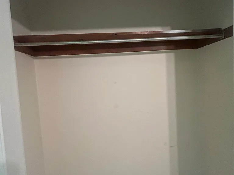 2nd bedroom has two identical closets like this... tons of storage!