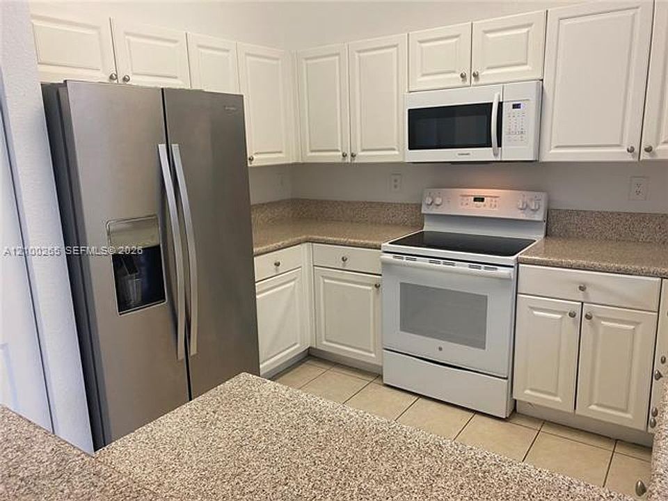 1st image of 12873 SW 134th St #Townhouse 12873