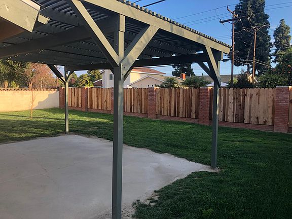 Backyard patio with sun shade