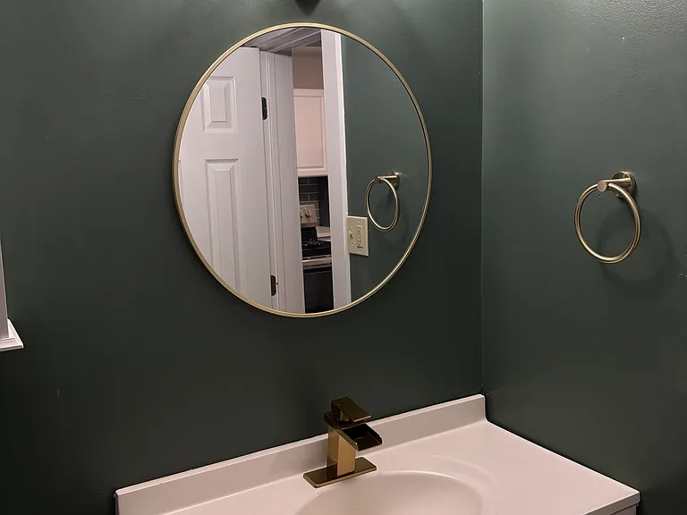 Bathroom new light fixture, vanity, mirror, and faucet