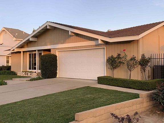 House Garage View and Side Gate Entry View.