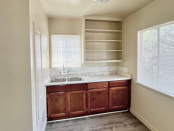 Light filled kitchen with double stainless steel sink