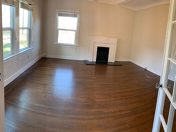 French doors lead to a large living room
