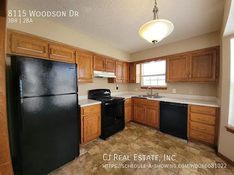 8115 Woodson Dr — Photo 3