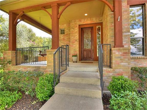 Inviting front porch with swing.
