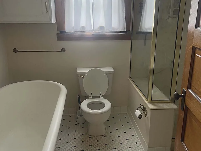 First Floor Master Bathroom with Shower, Antique Fixtures, Pedestal Sink and Clawfoot Tub