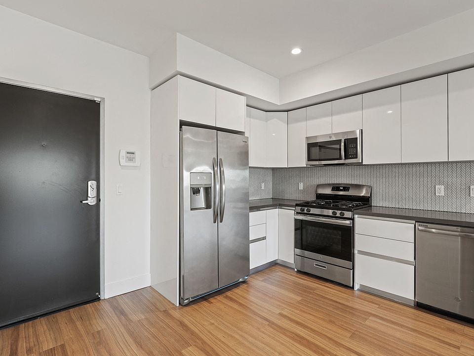 Front Entry of Apartment and Kitchen