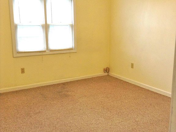 This carpet has been replaced by vinyl flooring