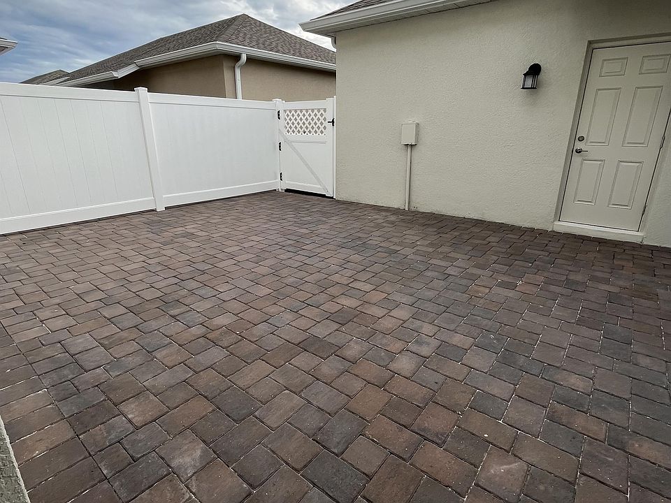 Beautiful courtyard between house and garage.