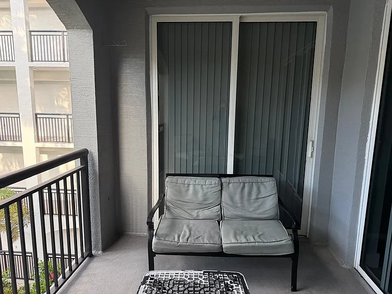 Covered patio with entry from great room and Master Bedroom with Impact windows and doors
