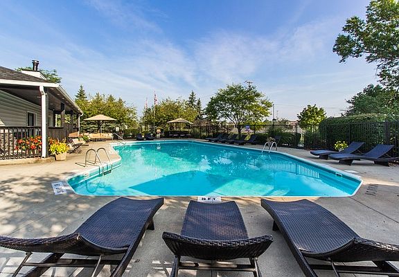 community pool with awesome furniture