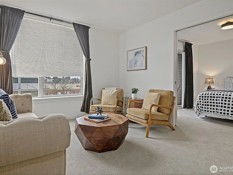 Create a cozy living area; pocket French doors divide the space.