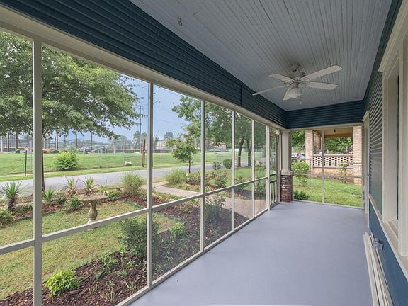 Big screen porch overlooking playing fields of Central High.