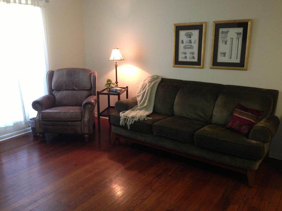 Living area with sofa & leather recliner