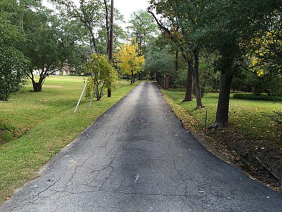 Entrance down private drive from Blalock Road