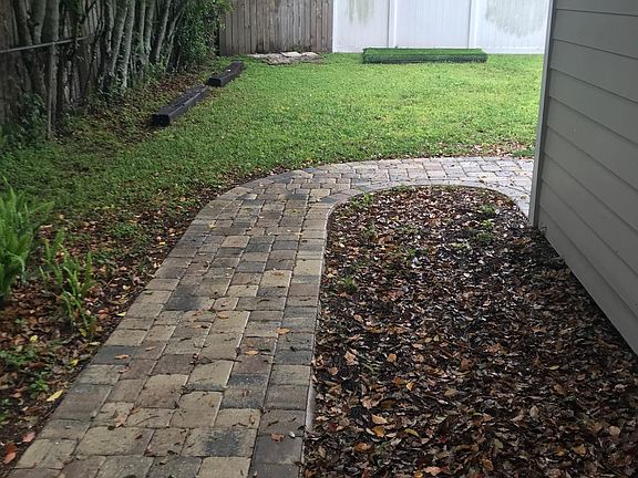 side of house and backyard