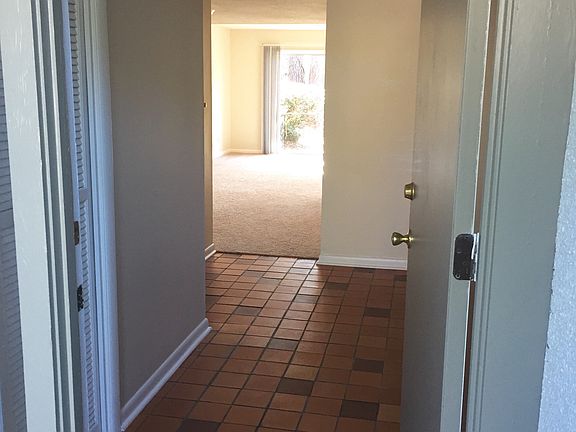 Entry Foyer looking into Living Rm with Kitchen to the left