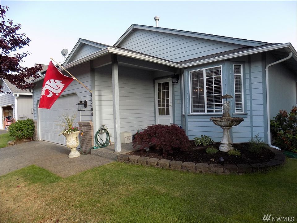 Updated Rambler Covered front entrance, New Wood Look Laminate  Flooring, Paint , Trim, Lighting, Hardware, Granite, Quartz, stainless steel appliances, Vaulted Ceiling in the Living room, Dining Open Concept Kitchen. Turn Key Home. Come see for yourself !
