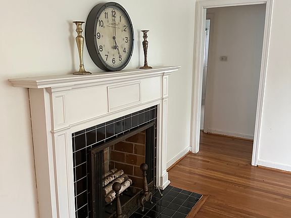 Living room looking towards hall- with attic storage (pull-down stairs).