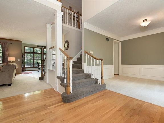 Gorgeous hardwood floor in the entrance - Formal Dining Room off the entryway.